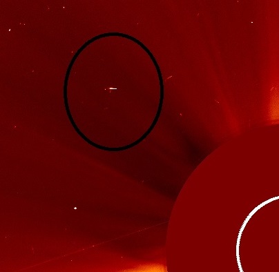 Alien spacecraft spotted hovering near sun in Nasa images say UFO theorists