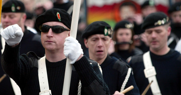 Sinn Fein supporters march in Strabane