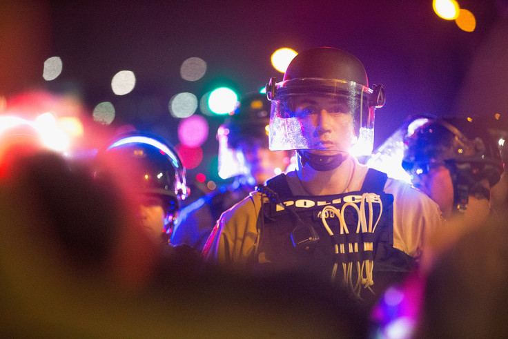 Ferguson anniversary police shot man