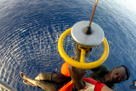 Italian navy helicopter rescue migrants