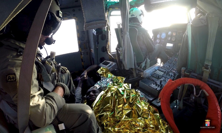 Migrant rescued Italian navy helicopter