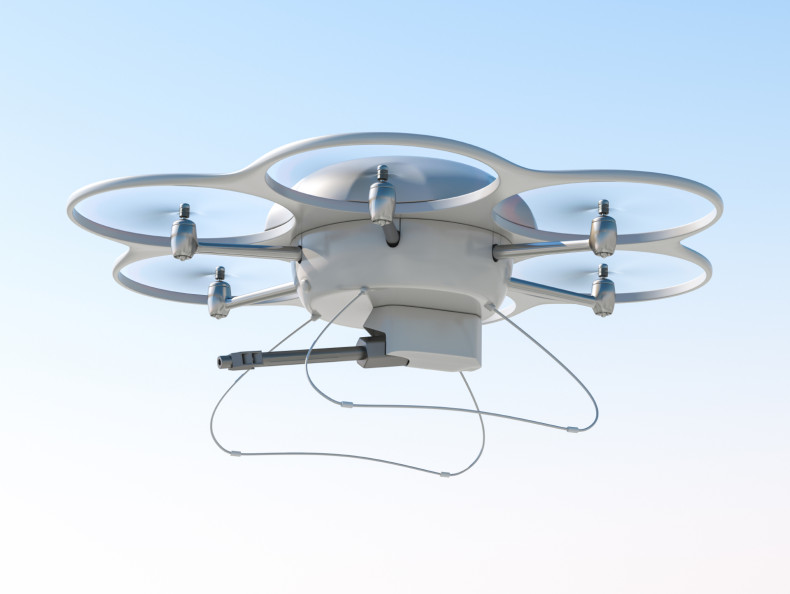 Consumer quadcopter drone mounted with a gun