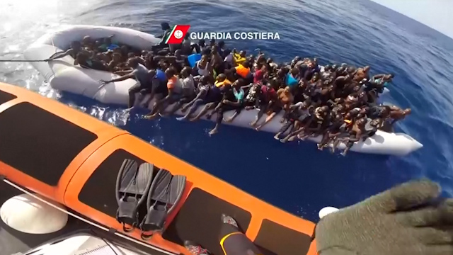 Migrants rescued from sea before dinghy deflates | IBTimes UK