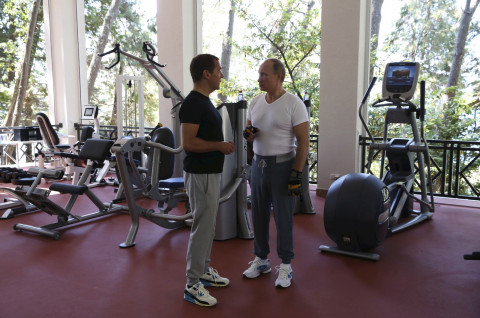 Putin and Medvedev in the gym