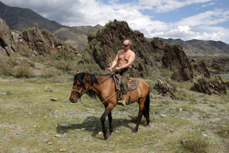 Putin rides a horse topless