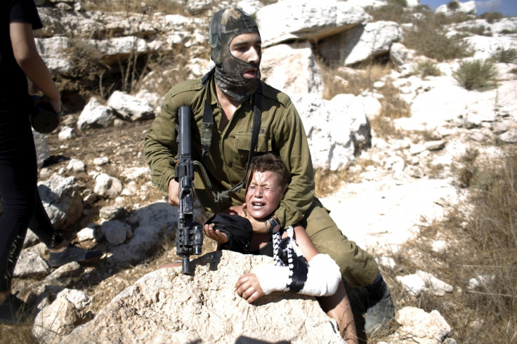 Israeli soldier Palestine boy
