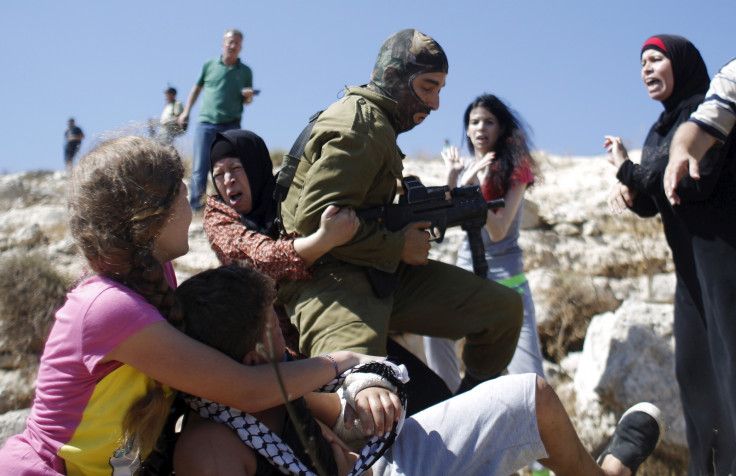 Israeli soldier and Palestine teenager