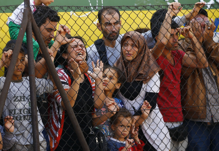 Migrants wait in Bicske Hungary