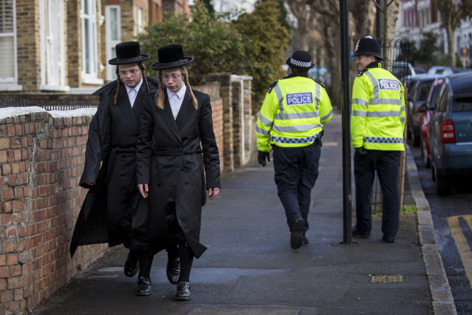 Jewish men walk in London