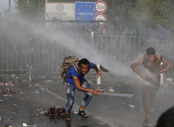 Hungarian riot police migrants Serbia