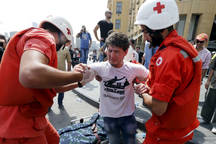 Riot police and protesters clash in Beirut