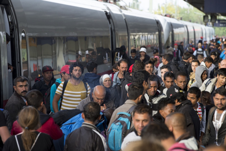 Refugees and immigrants arrive at Munich train