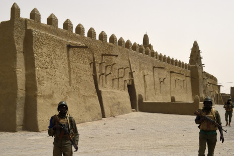 Malian soldiers patrol the ancient city of