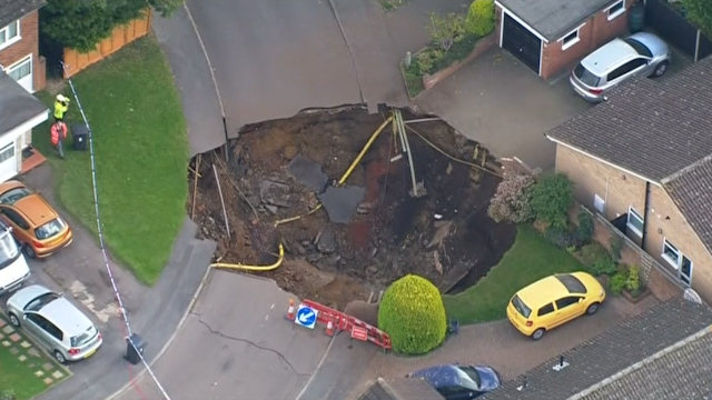 St Albans: Giant Sinkhole Opens Up In Residential Street Forcing ...