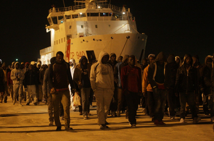 Migrants disembark