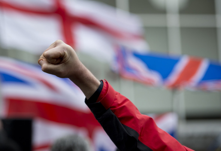 A demonstrator raises his fist at afar-rightdemoin