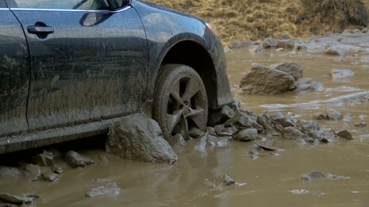 Cars stuck in mud