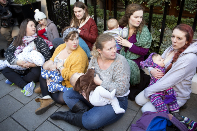 Women breastfeed outside Claridge's hotel in London
