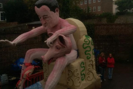 David Cameron and pig effigy