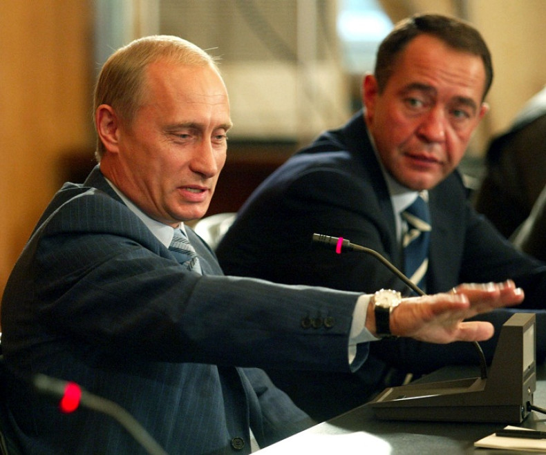 Mikhail Lesin and Vladimir Putin