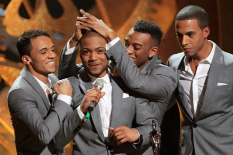 British band JLS accept the award for British single at the 30th Brit Awards ceremony in London