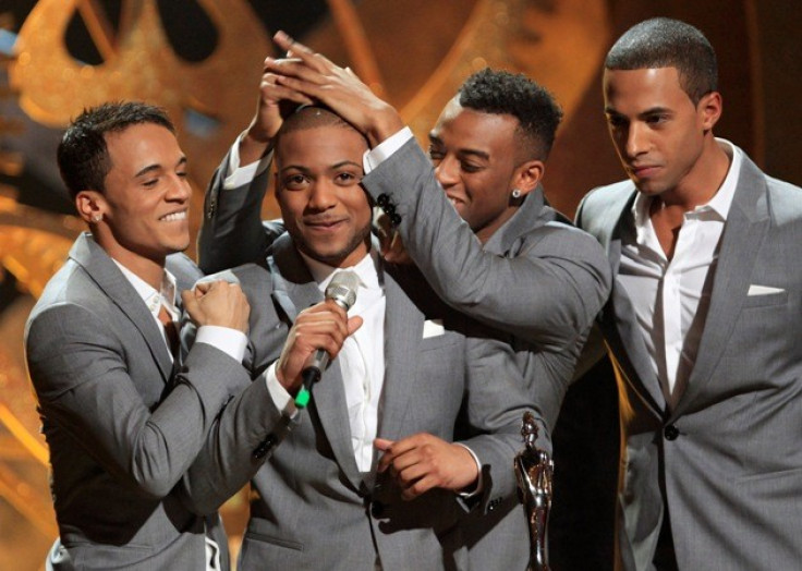 British band JLS accept the award for British single at the 30th Brit Awards ceremony in London
