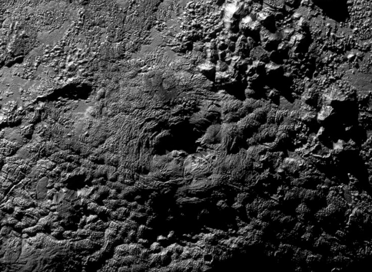 Pluto ice volcanoes