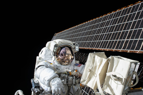 Nasa astronaut Scott Kelly working outside the International Space Station