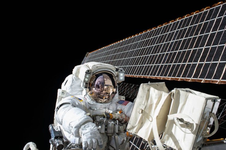 Nasa astronaut Scott Kelly working outside the International Space Station