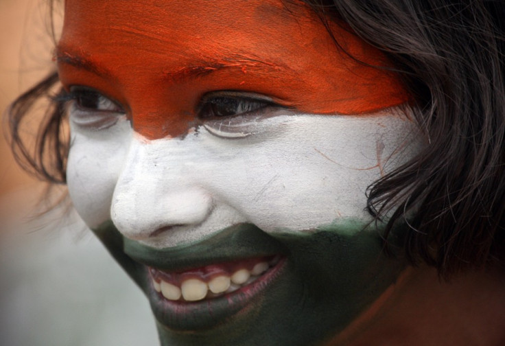 A school girl takes part in a cultural program to celebrate India's Independence Day in the northern Indian city of Chandigarh