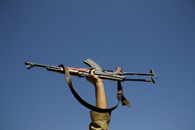 Kalashnikov AK-47 held in air