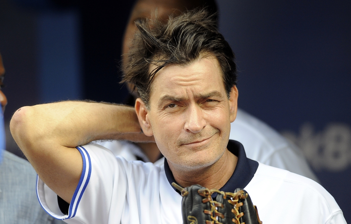 Charlie Sheen sex tape Alleged video of Two And A Half Men star engaging in sex act touted around Hollywood
