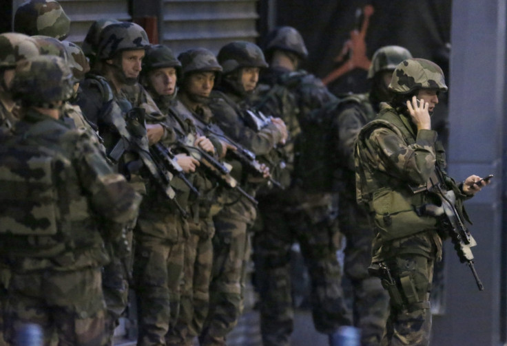 French soldiers secure area in Saint-Denis