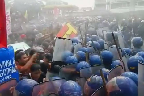Riot police battled with protesters in Manila