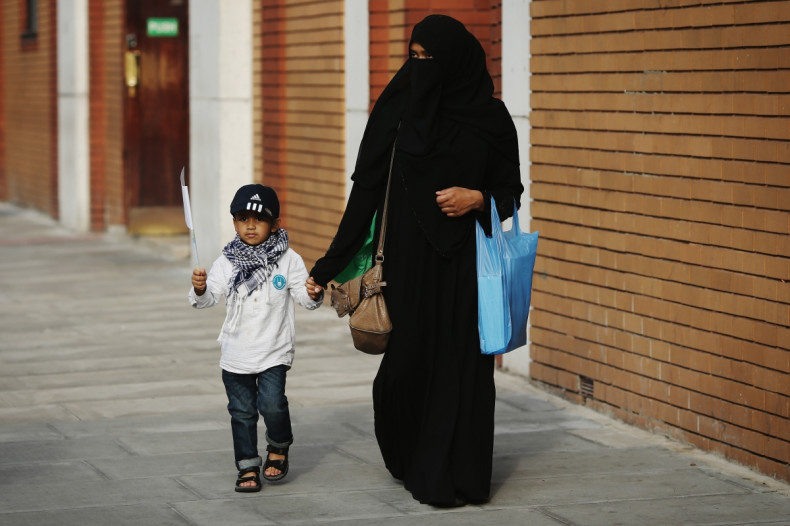 British Muslim woman and her child