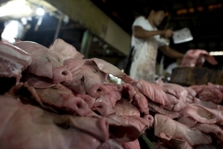 Heads of pigs in butcher shop