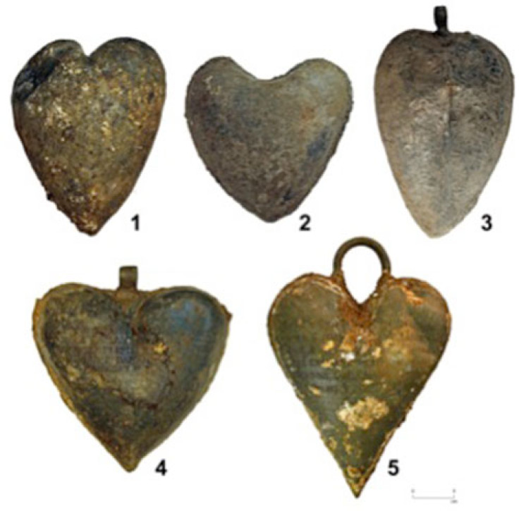 five heart-shaped lead urns