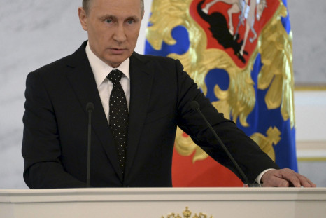 Russian President Vladimir Putin addresses the StateDuma
