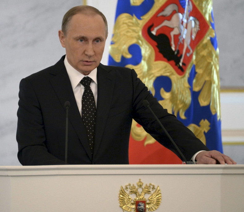Russian President Vladimir Putin addresses the StateDuma