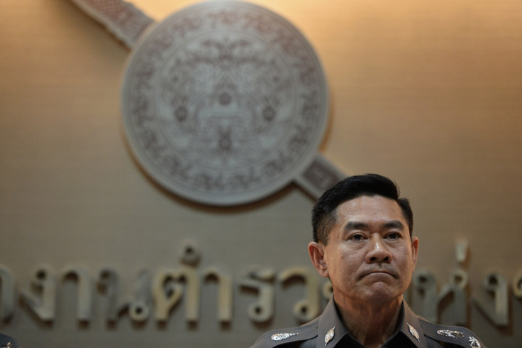 Thai deputy police spokesman Major General Songpol Wattanachai listens to a question during a press conference