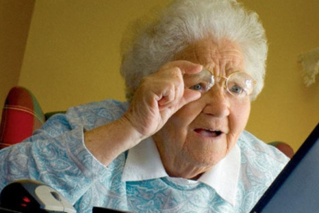 Grandma looks at TV screen