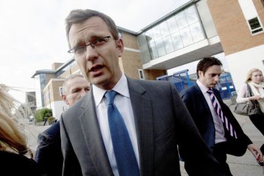 Andy Coulson, the former spokesman for Britain&#039;s Prime Minister David Cameron, leaves a police station after being bailed, in South London