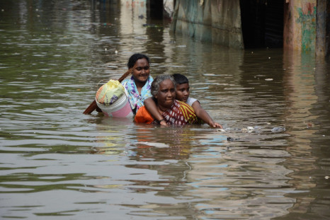 Women walk in Chennai floods