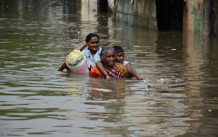 Women walk in Chennai floods