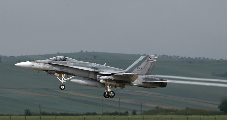Canadian F-18 Hornet takes off from an