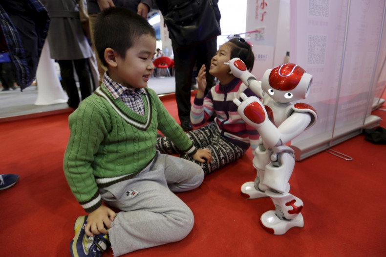 Nao humanoid robot plays with children