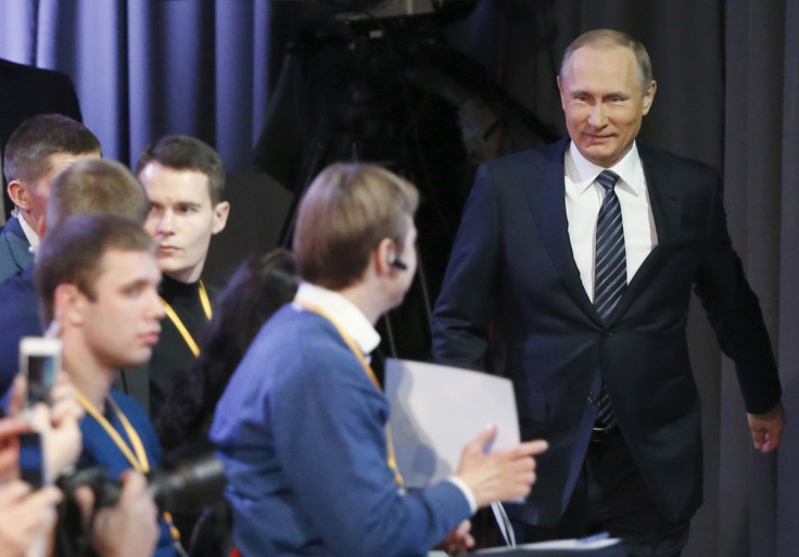 Putin enters room