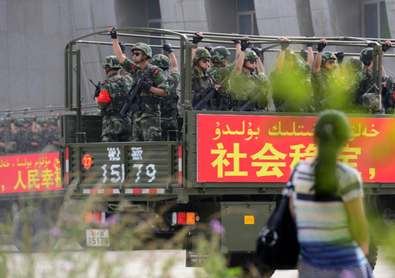 Chinese military patrol China's Xinjiang province