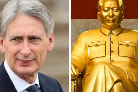 Philip Hammond and a gold statue of Chairman Mao