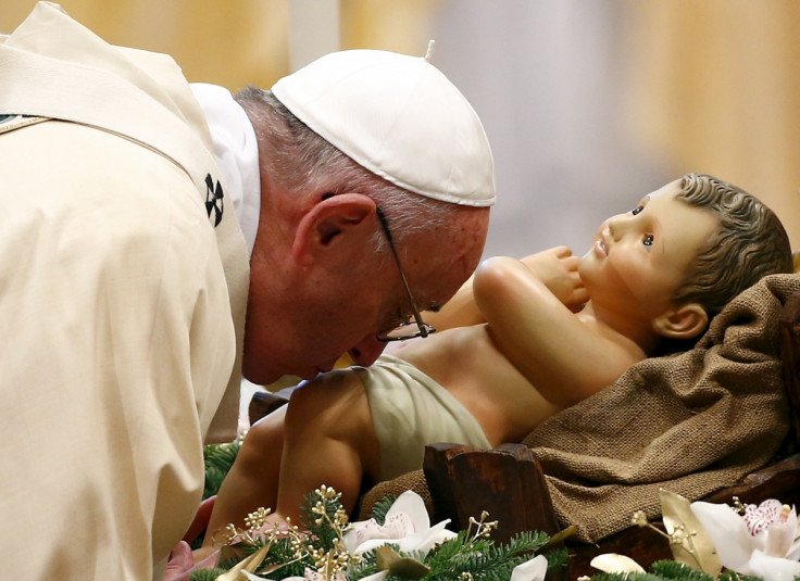 pope francis kissing baby jesus